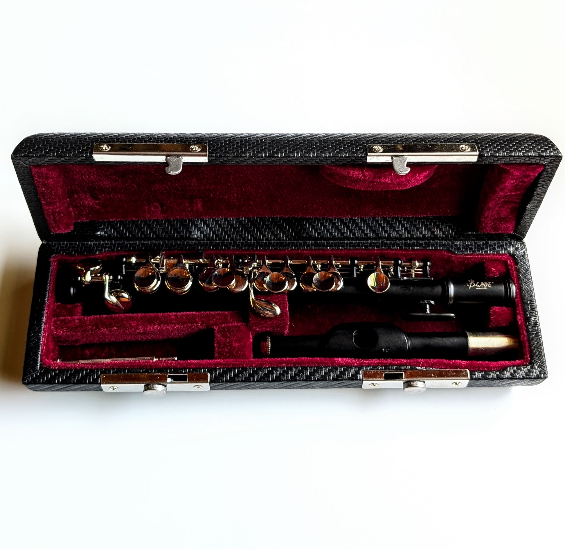 Black finished metal piccolo flute by PNW Music for student to intermediate players with precision key mechanisms