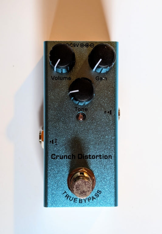 PNW Music vintage crunch distortion guitar effects pedal with dynamic midrange voicing for classic rock tones and tube-like saturation