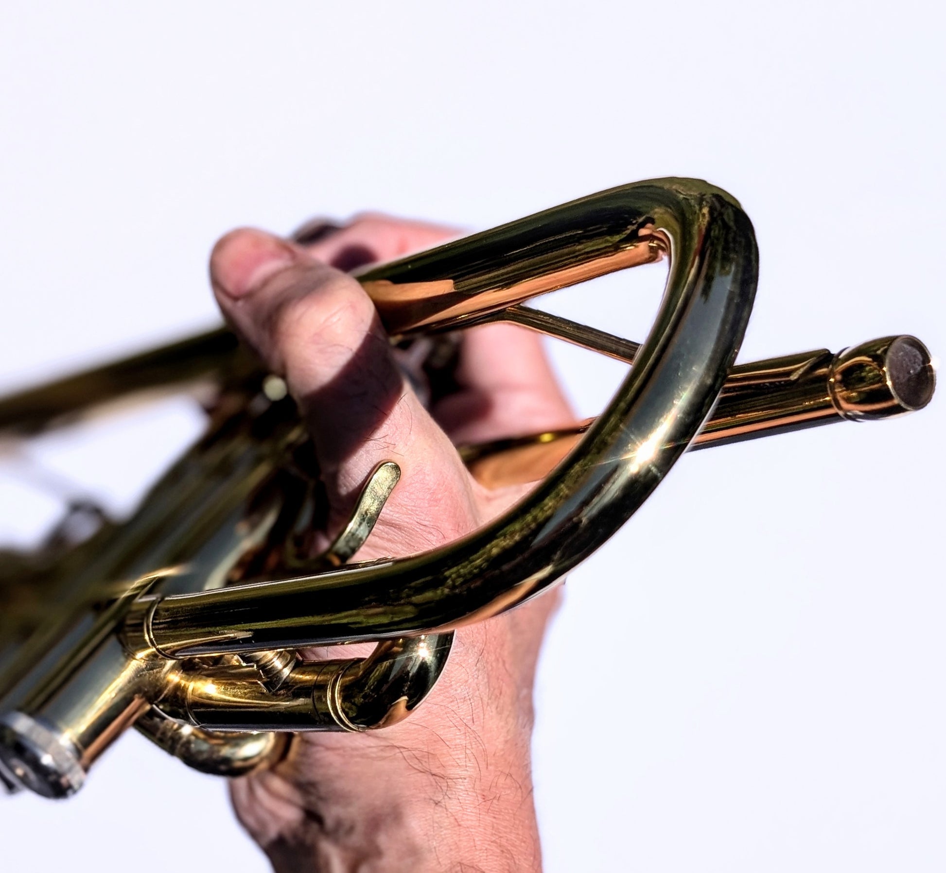 Bright brass student trumpet by PNW Music with classic brass finish and upgraded 7C mouthpiece for beginning musicians