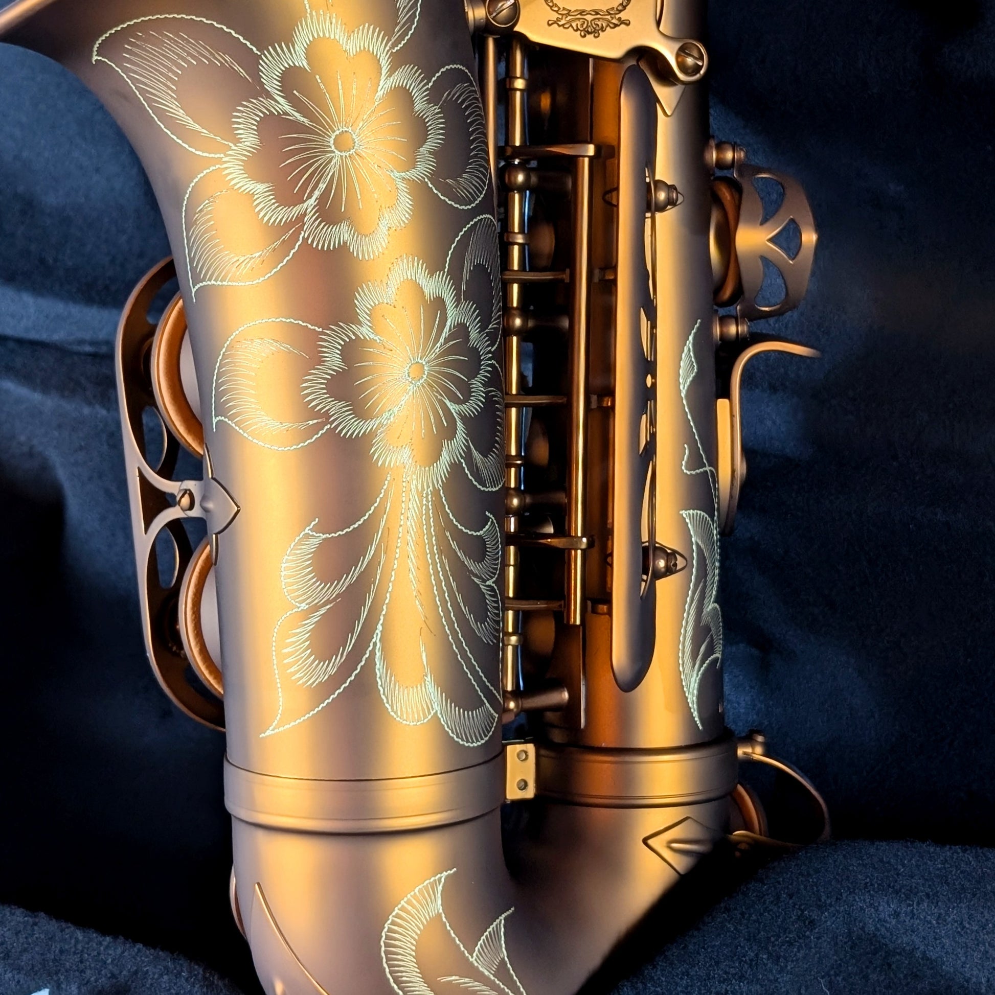 Alto saxophone with distinctive coffee and caramel matte finish, featuring high F# key for student and intermediate players