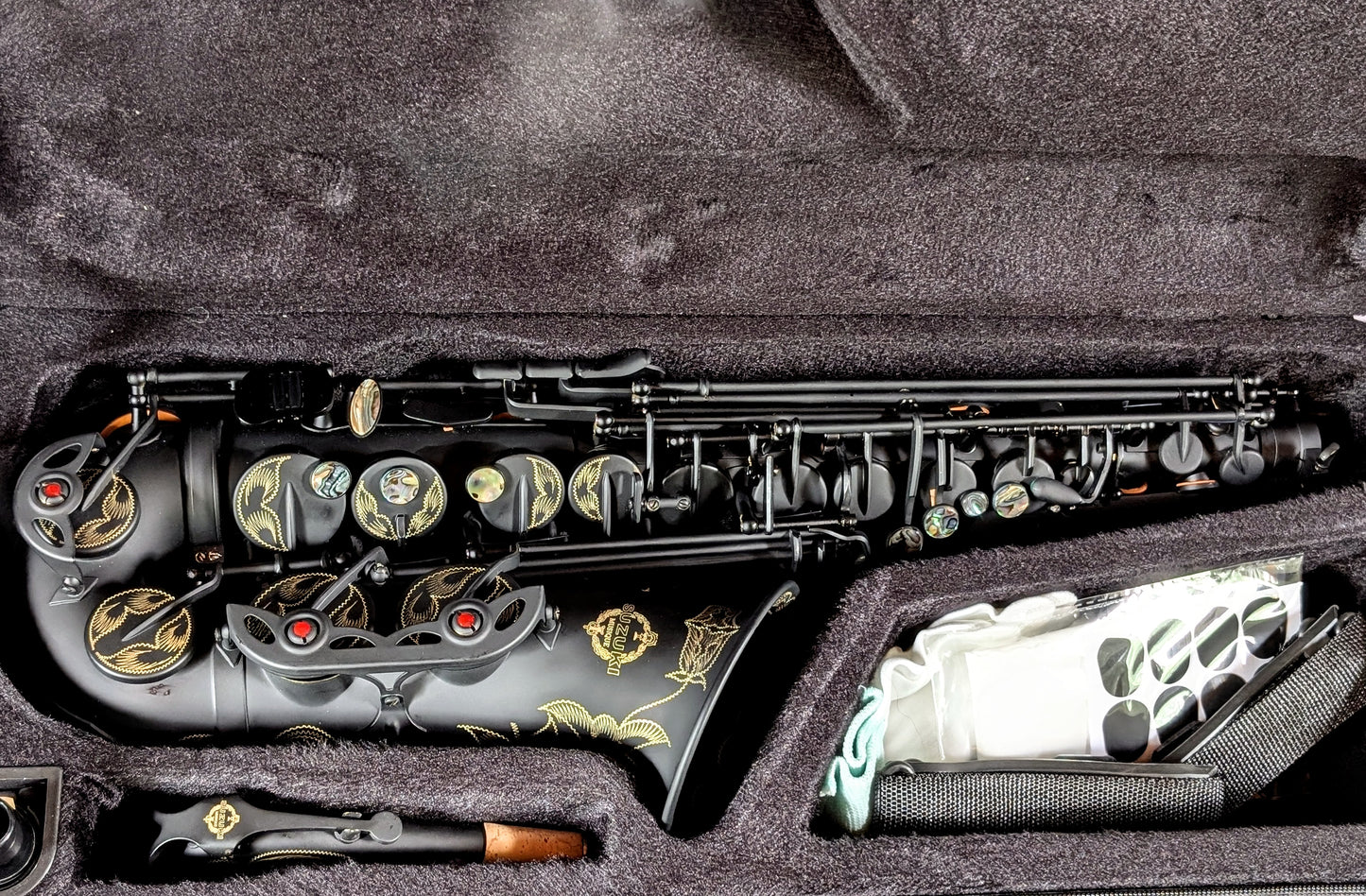 PNW Music matte black alto saxophone with Japanese-inspired finish, featuring high F# key and non-reflective surface for students