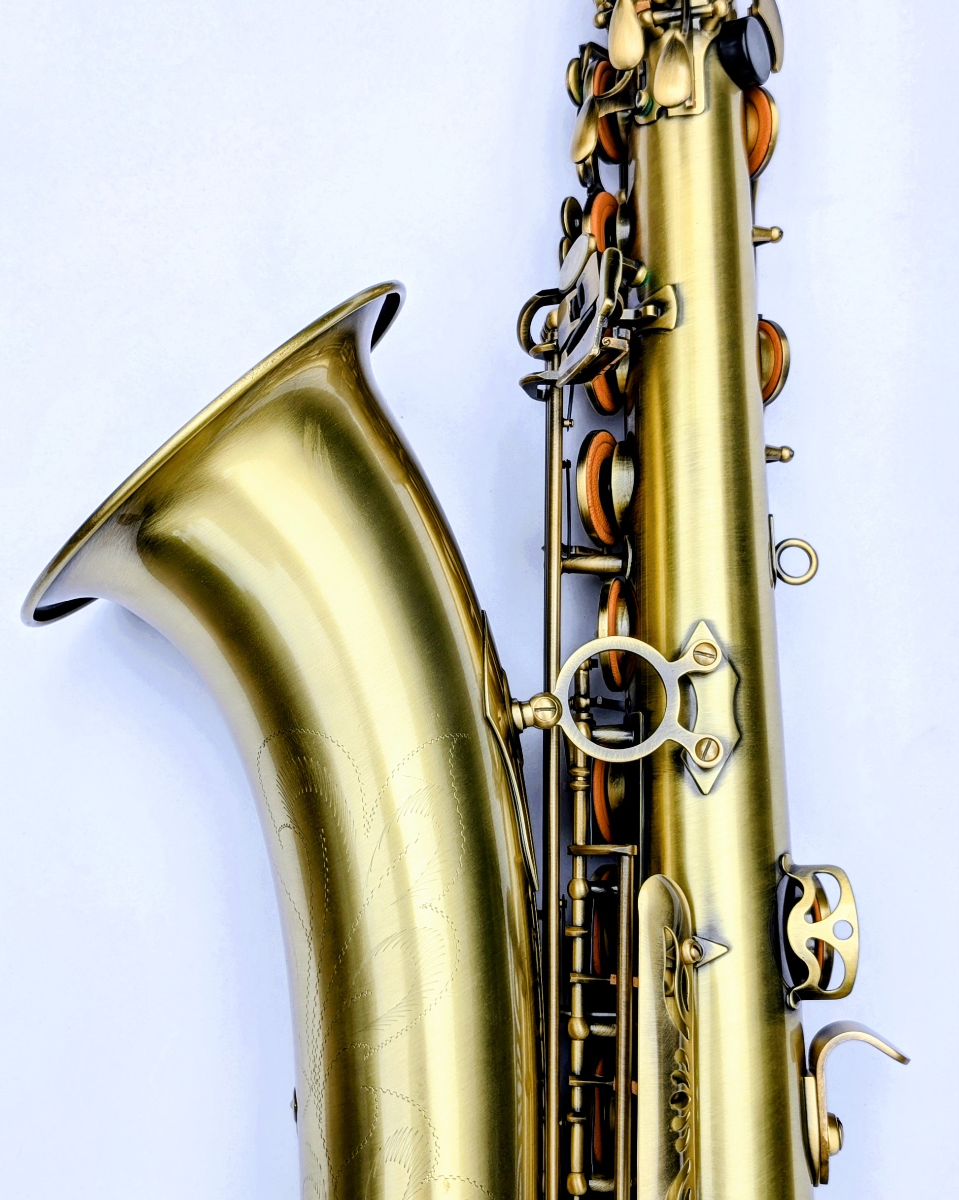 House matte brass tenor saxophone with responsive key action, reinforced posts, perfect for student and developing players