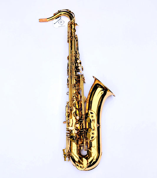 Slade bright brass tenor saxophone with gold lacquer finish, featuring responsive keys and reinforced posts for beginning students