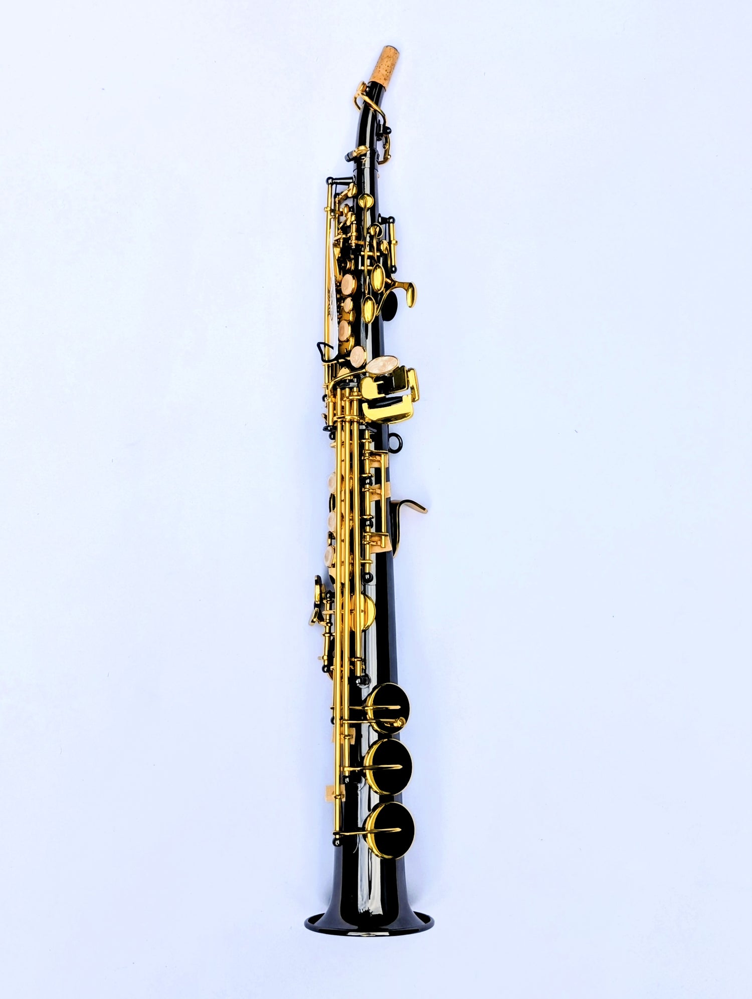 Black nickel-plated soprano saxophone from PNW Music Foundation II series with brass keys and dark metallic finish for Premium musicians