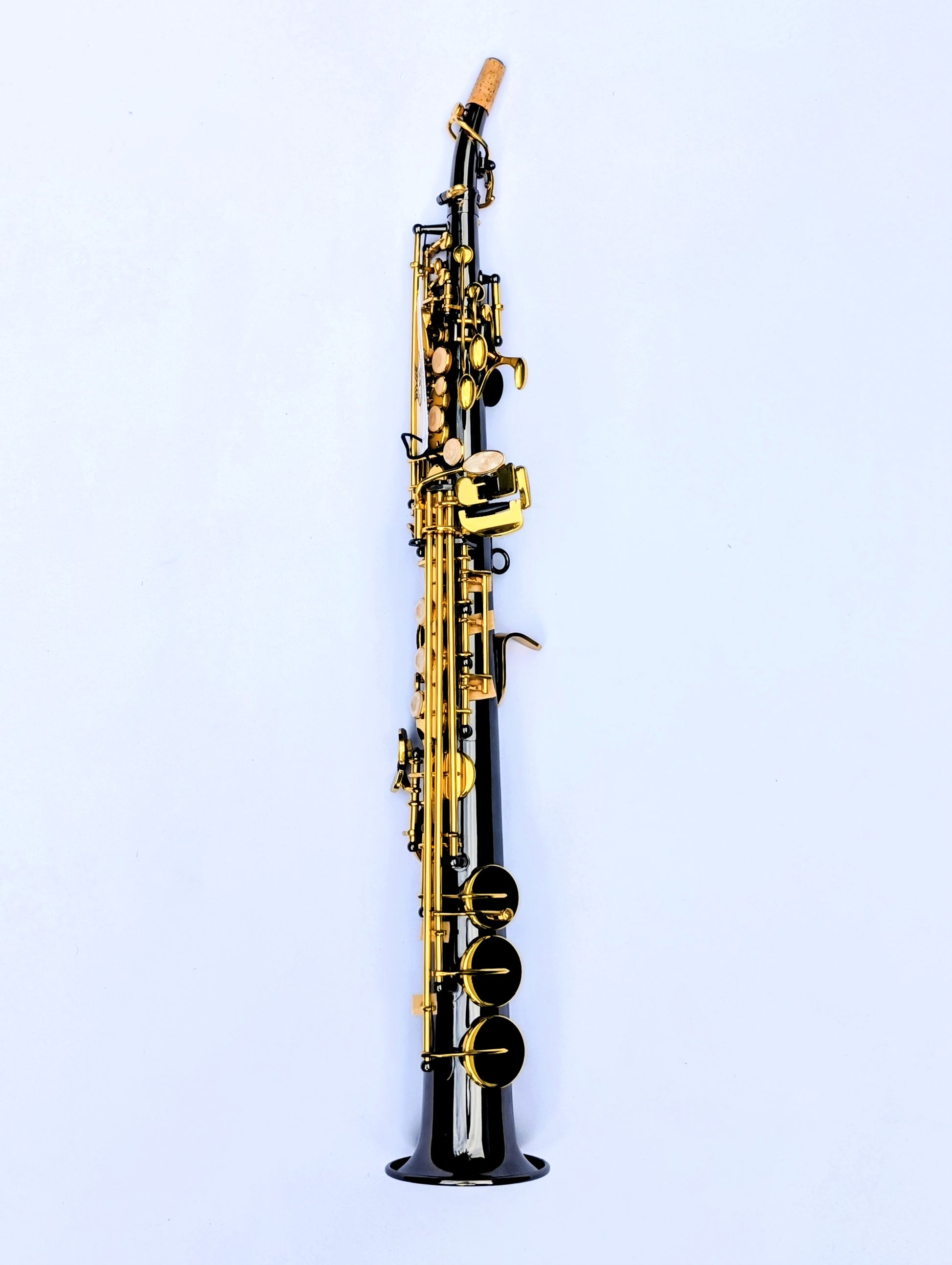 Black nickel-plated soprano saxophone from PNW Music Foundation II series with brass keys and dark metallic finish for Premium musicians