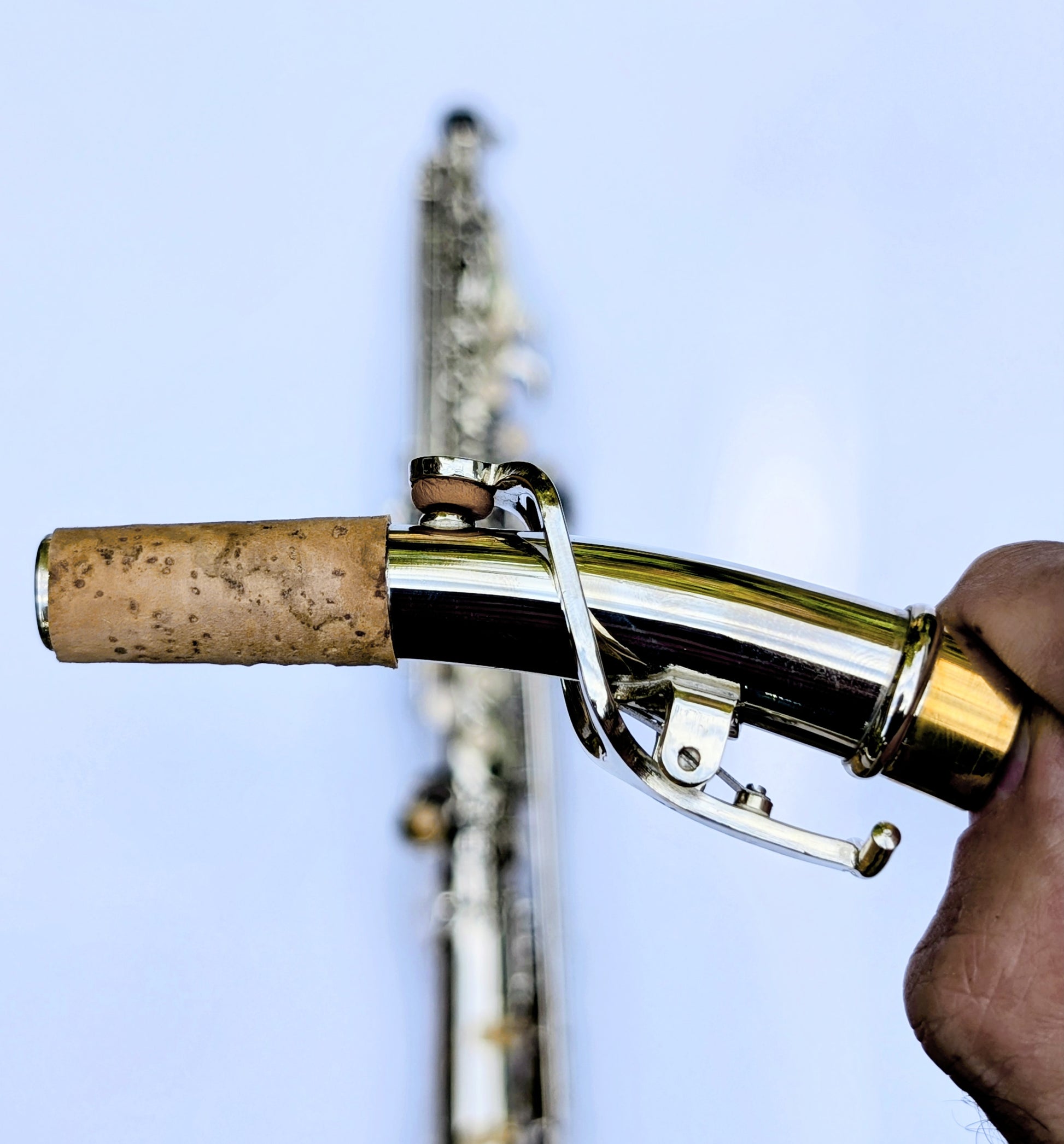 PNW Foundation II Series nickel silver soprano saxophone with gleaming nickel-plated body and brass keys on white background