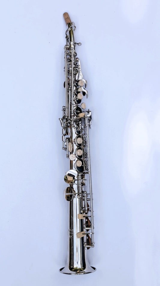 PNW Foundation II Series nickel silver soprano saxophone with gleaming nickel-plated body and brass keys on white background