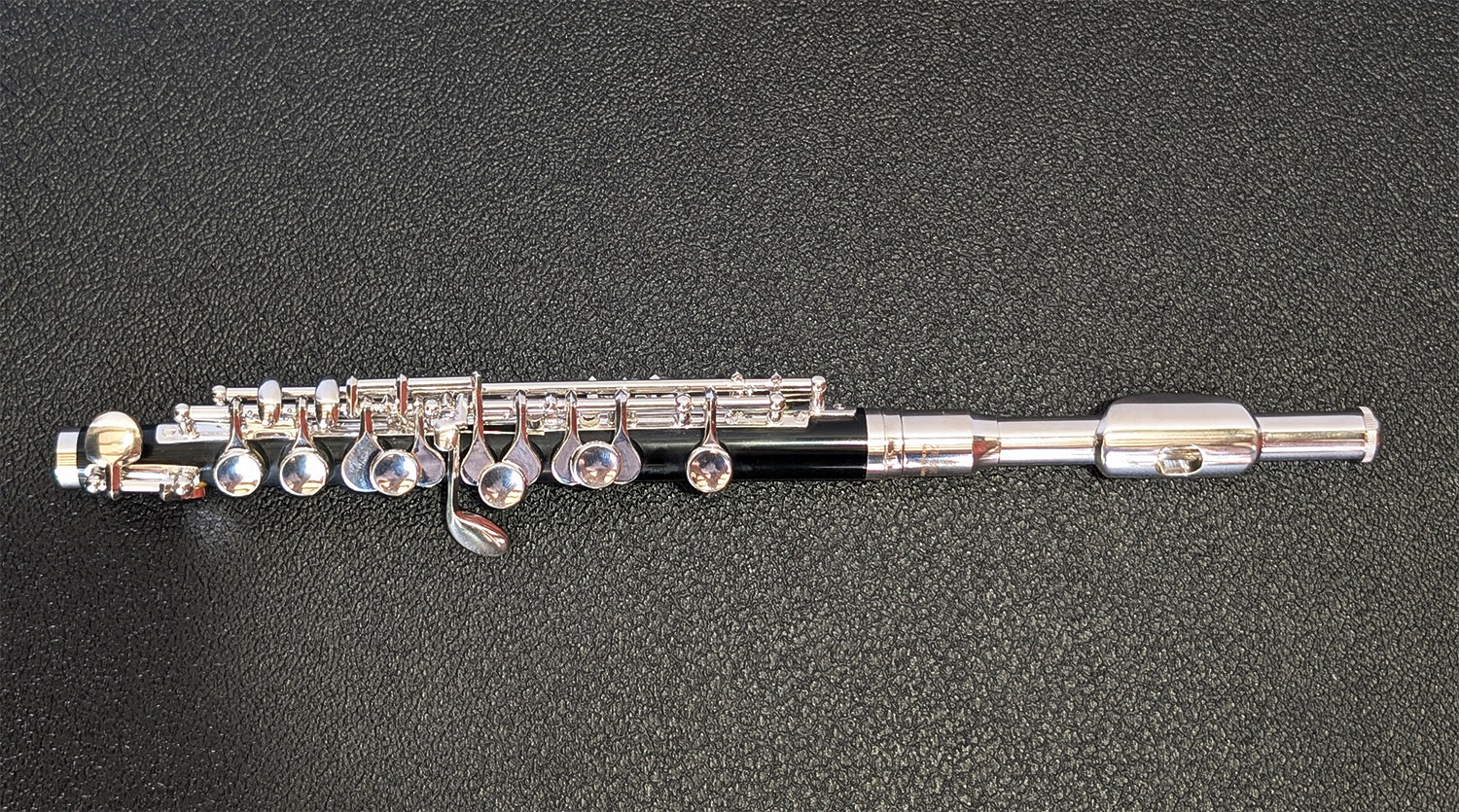 Slade silver-plated headjoint piccolo with black Bakelite body, silver-plated keys and mechanisms for student to intermediate players