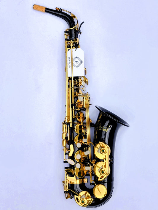 Black lacquered alto saxophone with brass keys and decorative engraving, featuring Premium high F# key for extended range